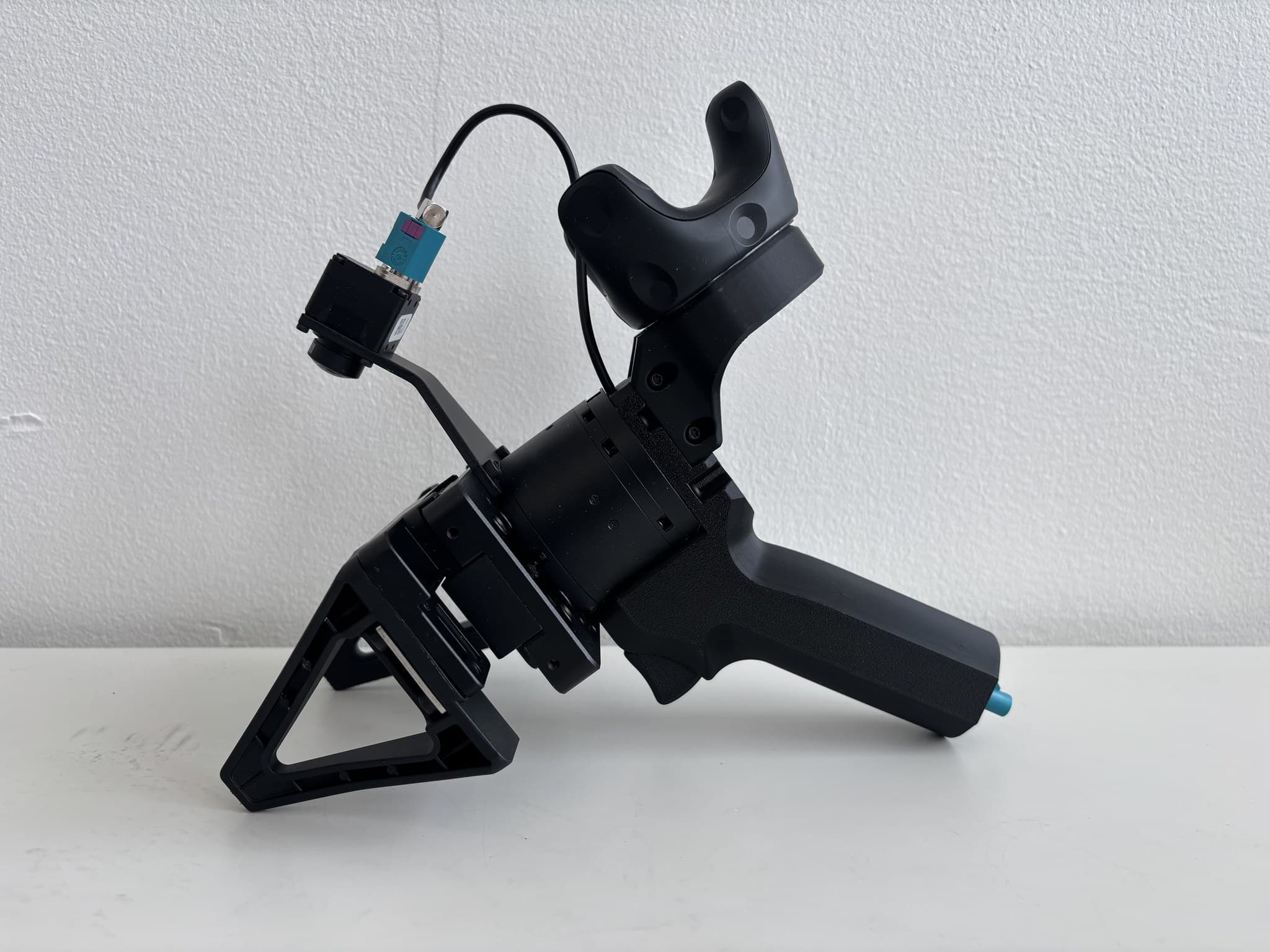 Mantis UMI handheld gripper with wrist camera and Vive tracker mount